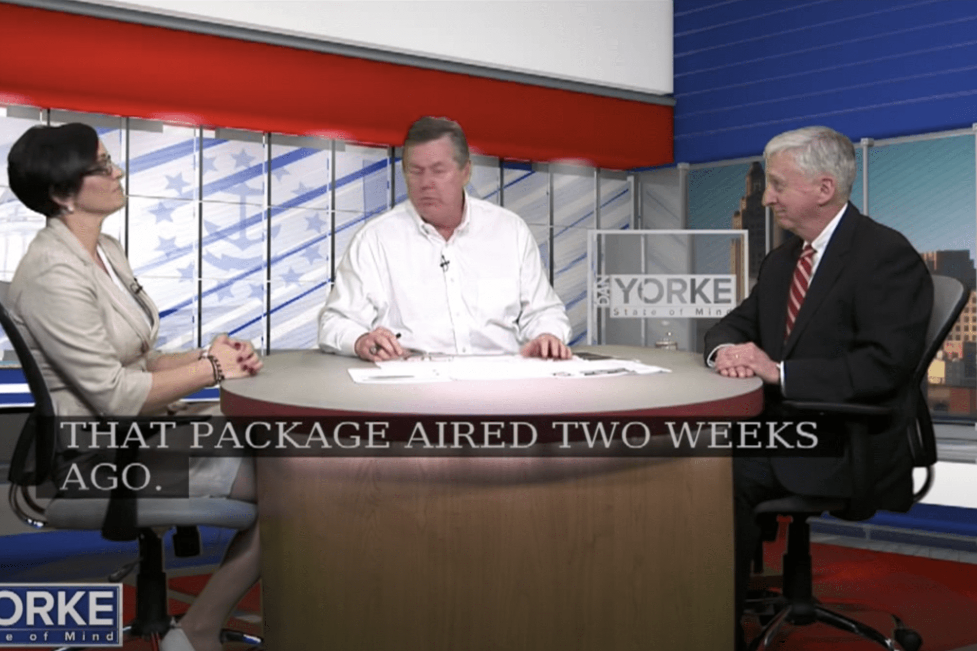 Jina Petrarca speaking to Dan Yorke at his desk on the Dan Yorke television show