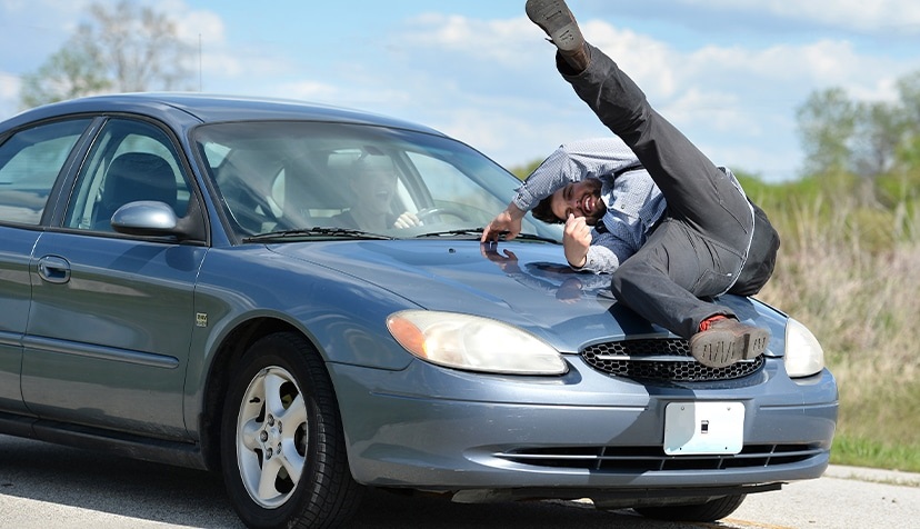 A person in a pedestrian accident getting hit by a car in Rhode Island